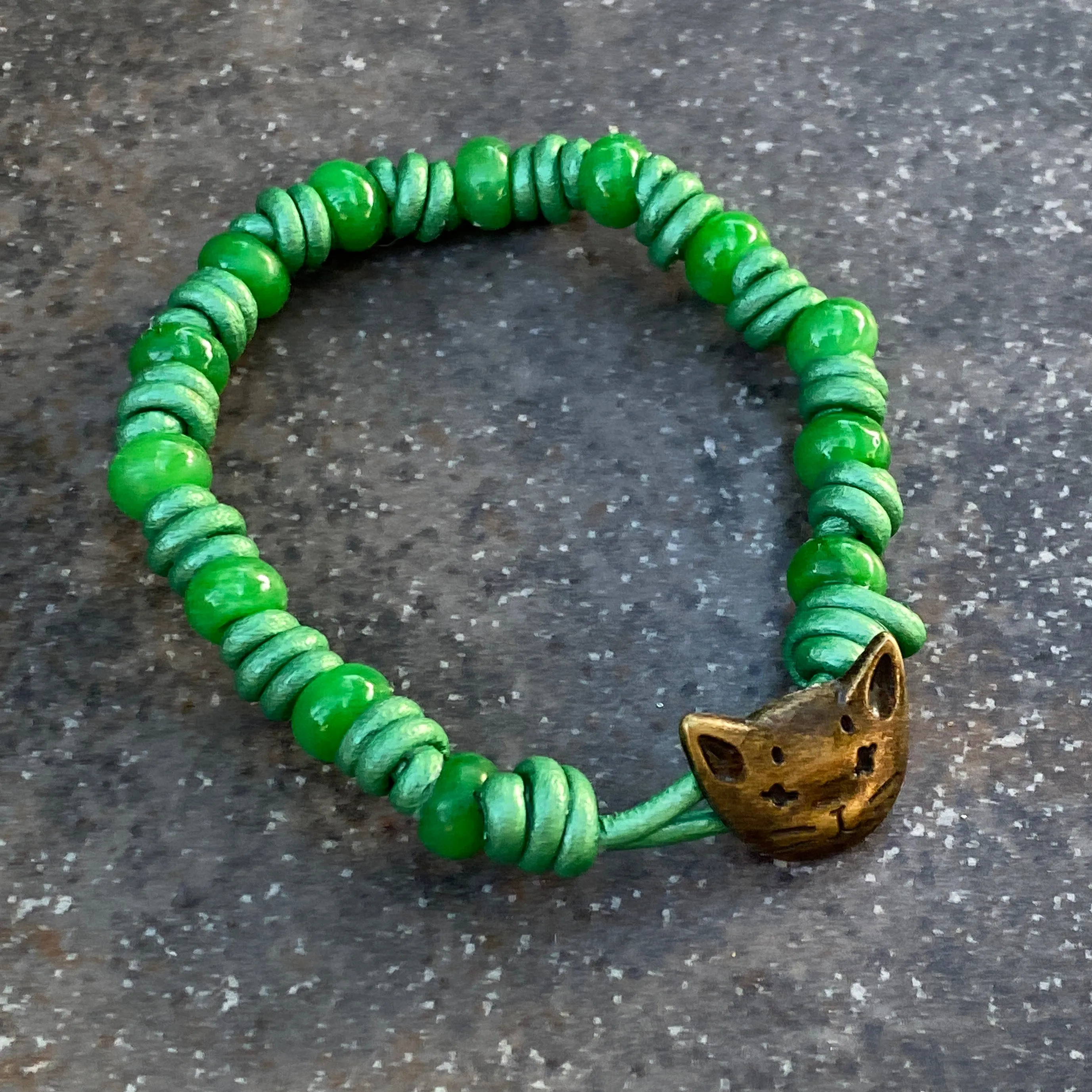 Hand knotted Jade gemstone on green Leather Bracelet