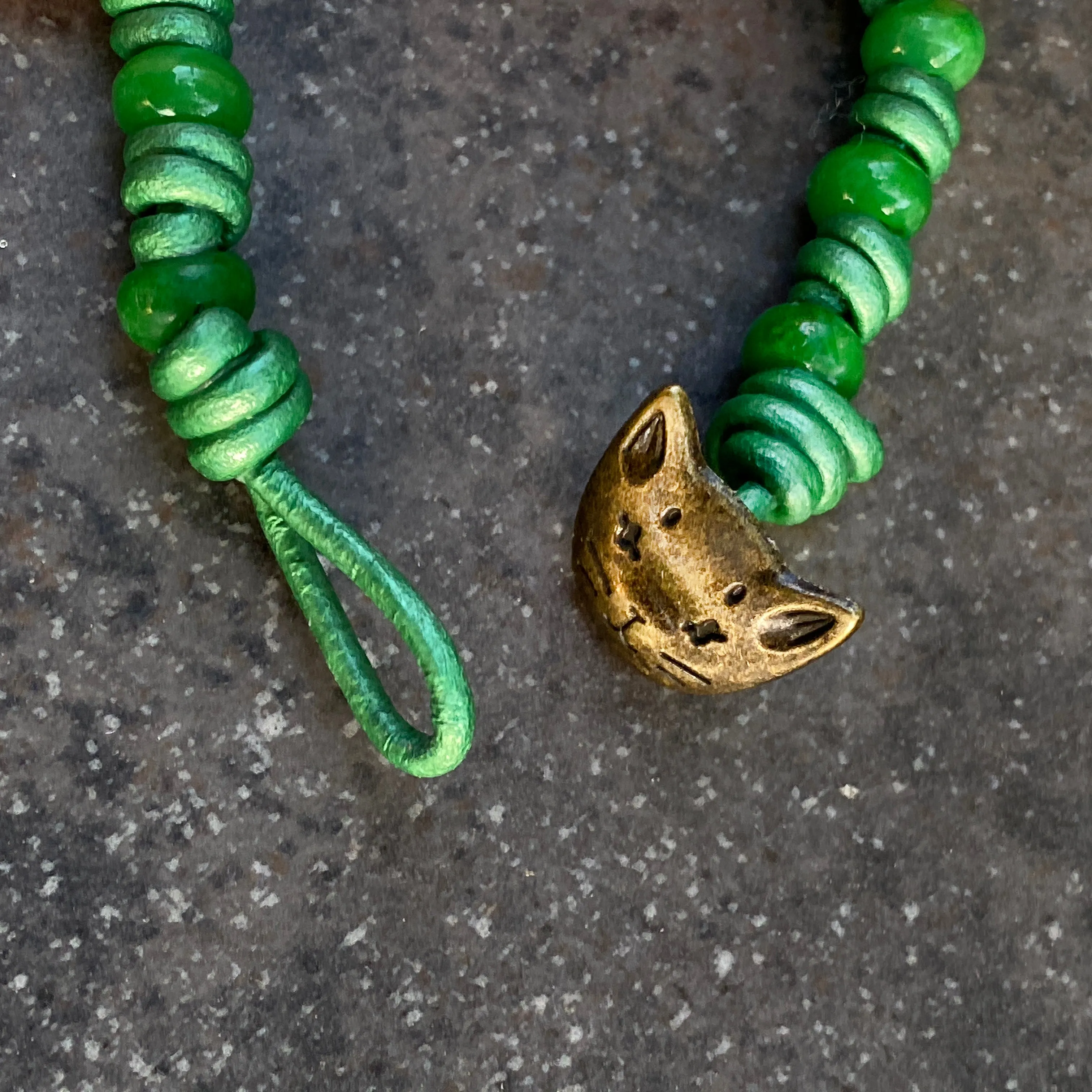 Hand knotted Jade gemstone on green Leather Bracelet