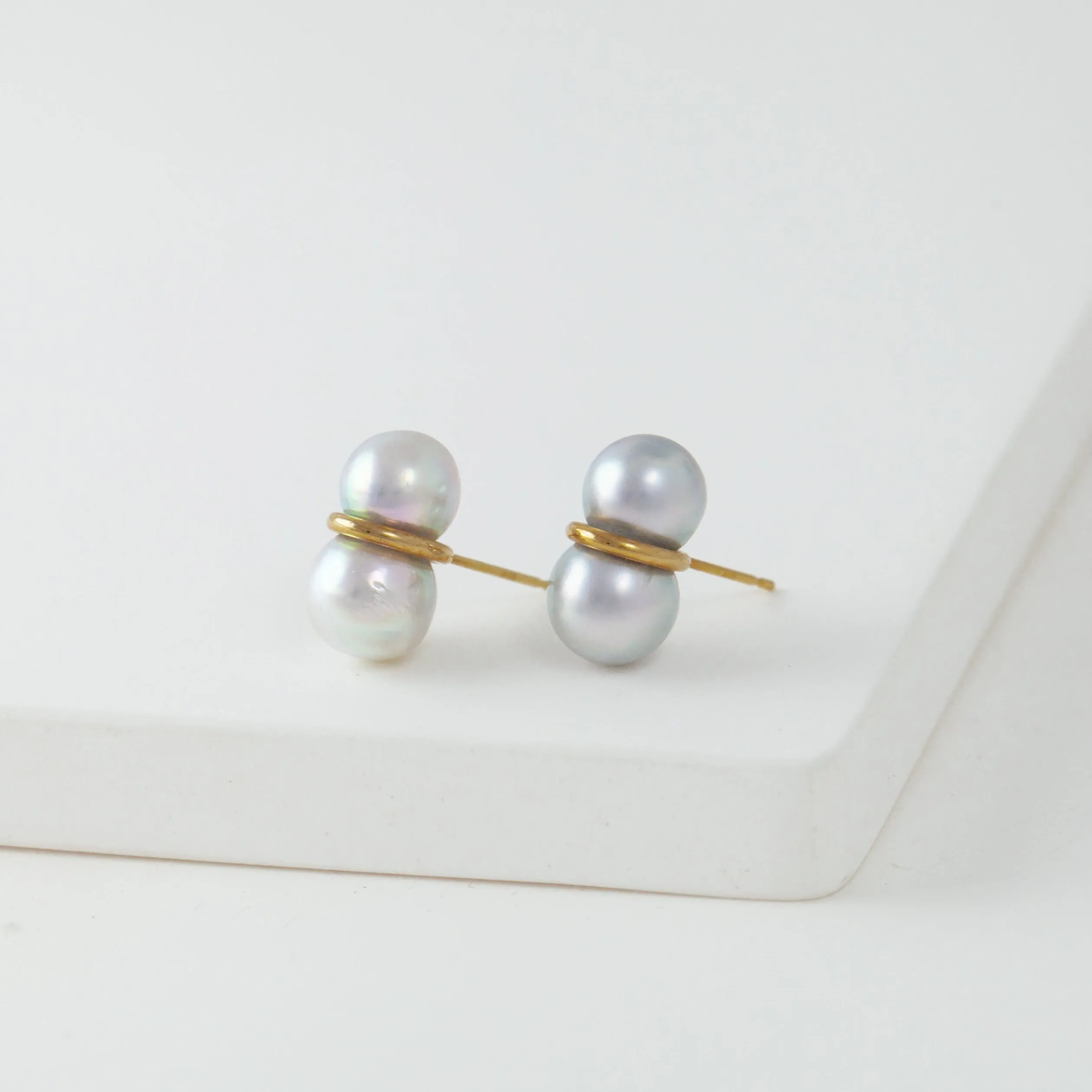 Large twin pearl earrings