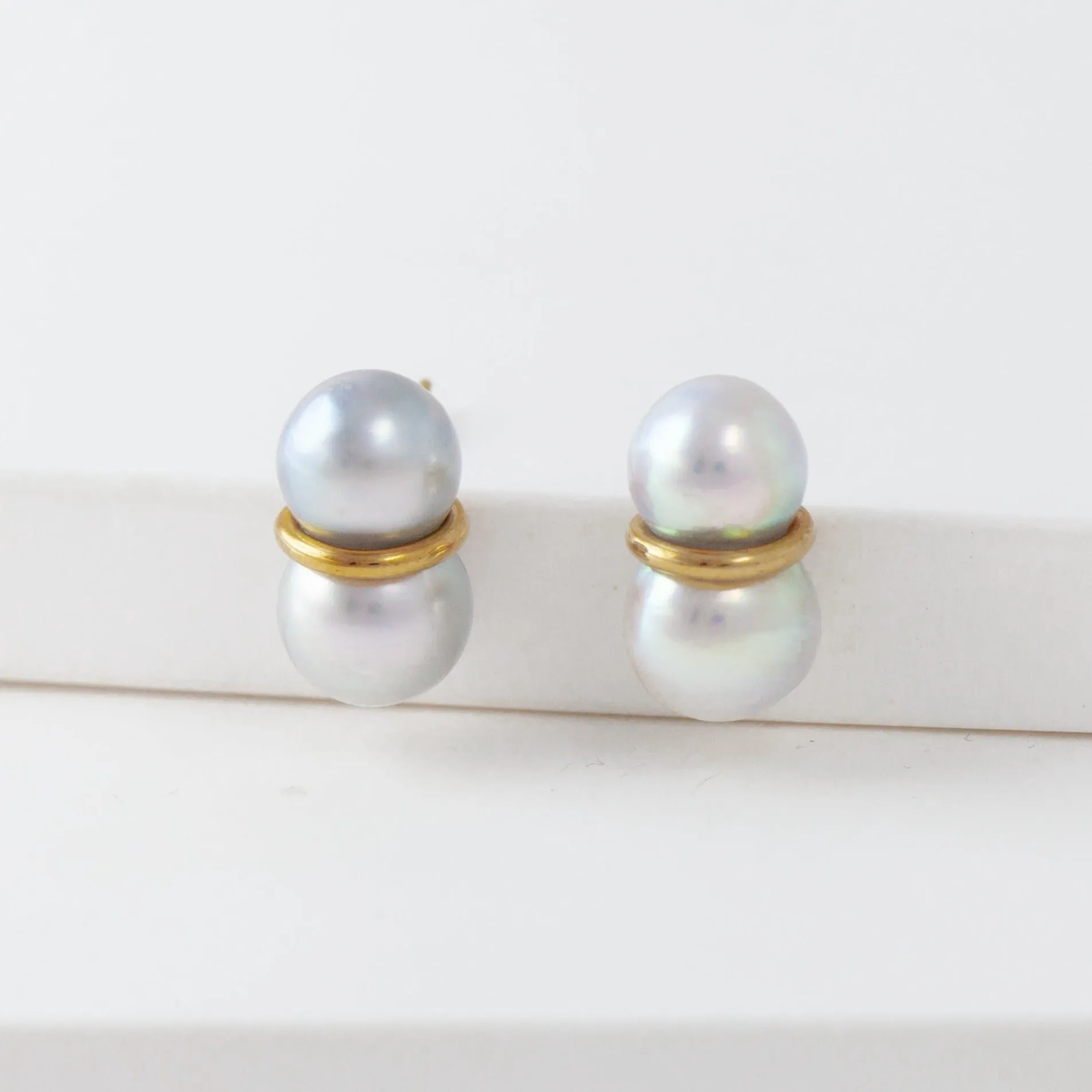 Large twin pearl earrings