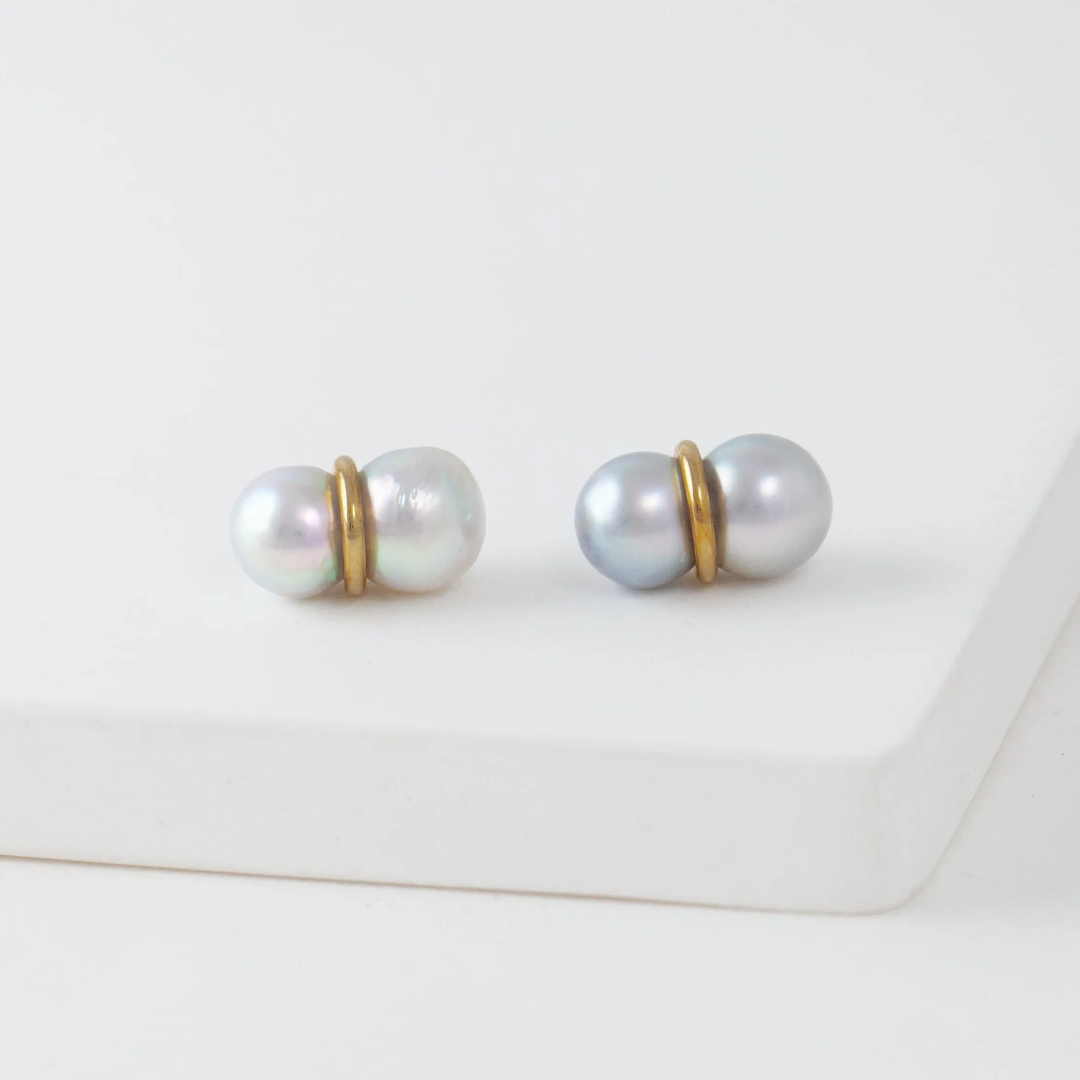 Large twin pearl earrings
