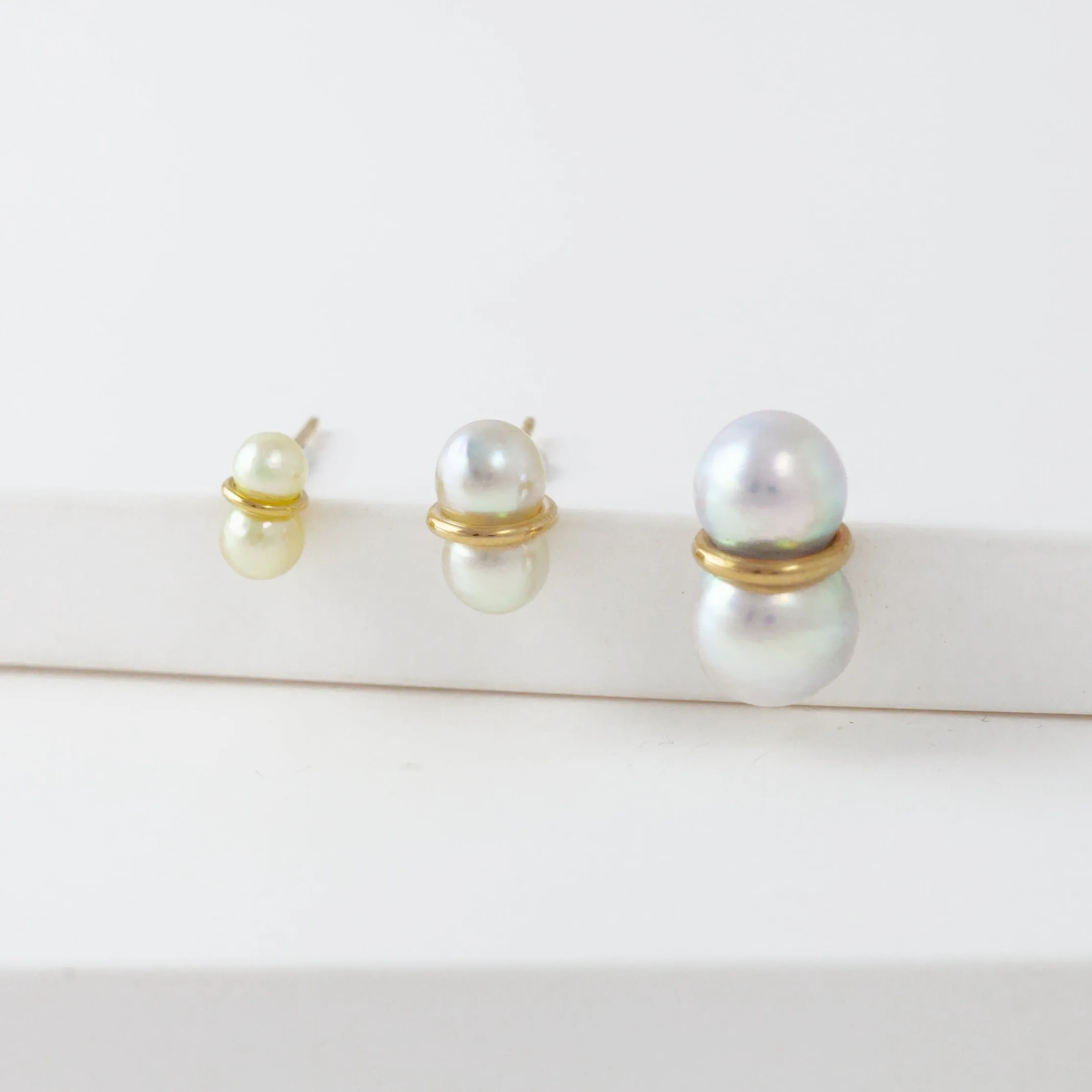Large twin pearl earrings