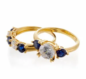 Round and Sapphire Blue Accent Cubic Zirconia Three Stone Bridal Set In Yellow Gold Plated  Sterling Silver